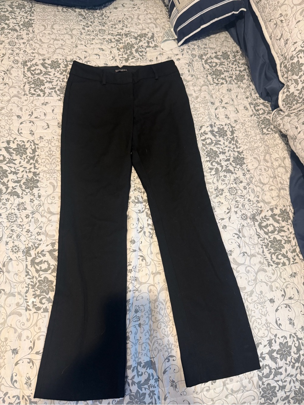 Women’s flare leg classic black dress pants from Express size x small.